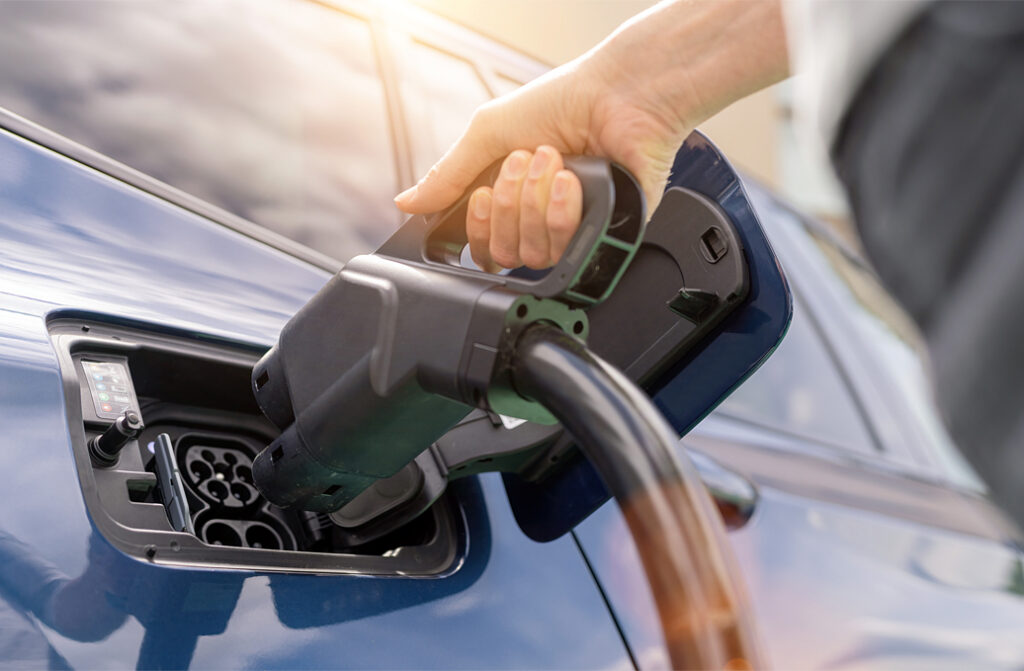 DC Fast Charger Being Plugged into an Electric Vehicle